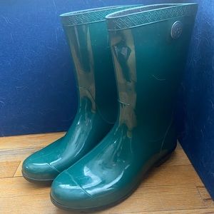 Green Ugg brand rain boots